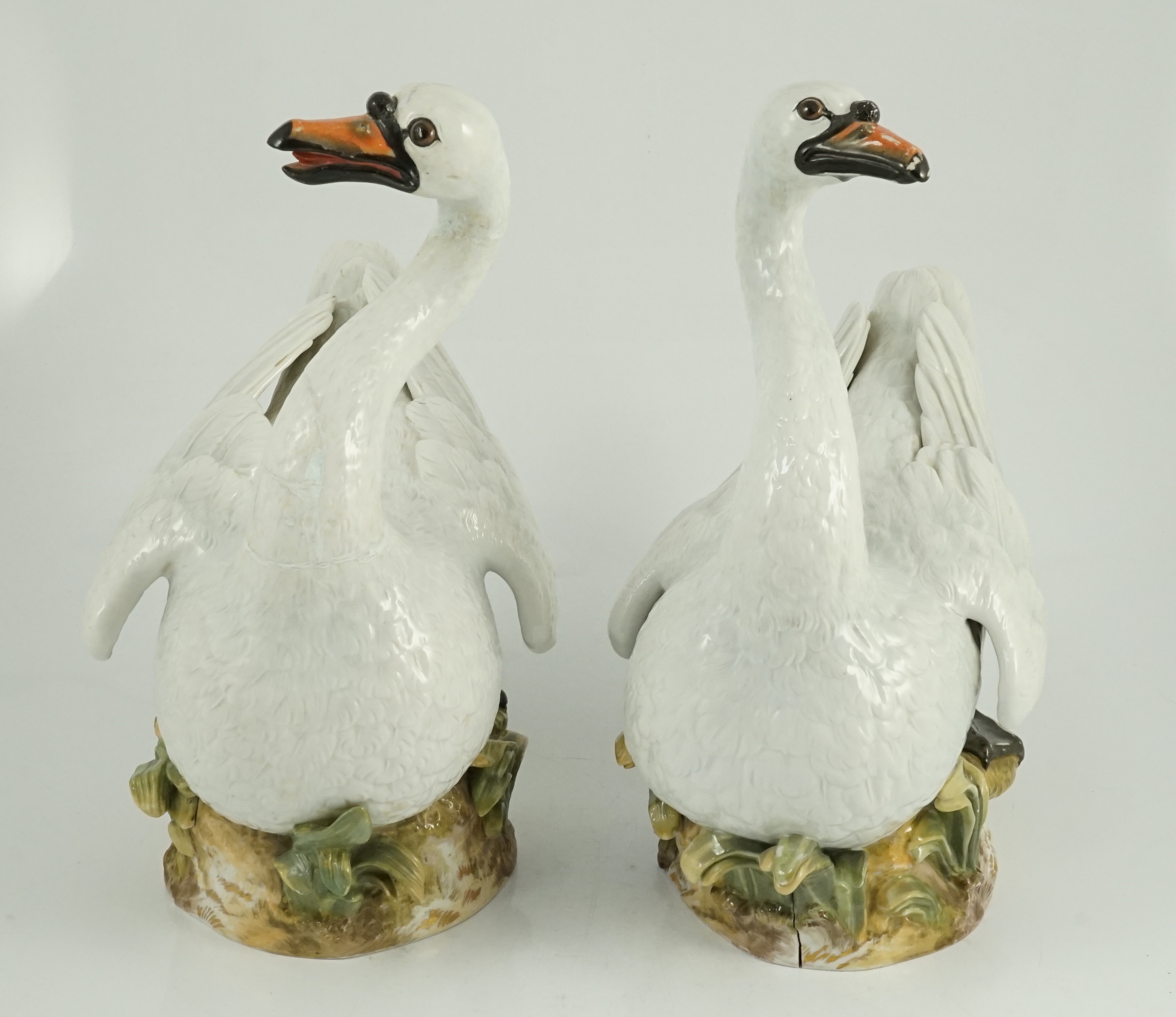 A pair of large Meissen models of swans, 19th century, one neck restored